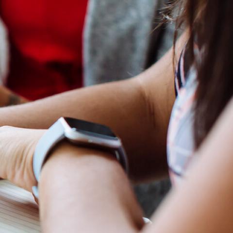 Postgrad students taking notes and planning essay