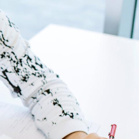 Students taking notes together